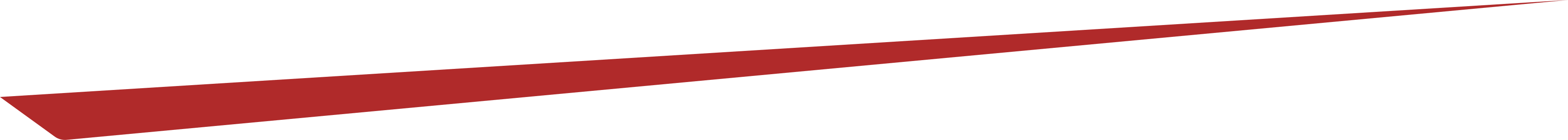 Red triangular shape on black background.